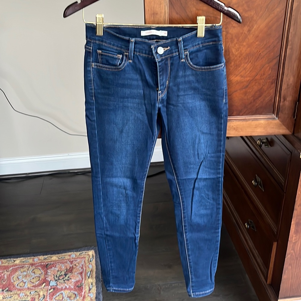 Levi’s dark blue jeans: 710 super skinny size 26